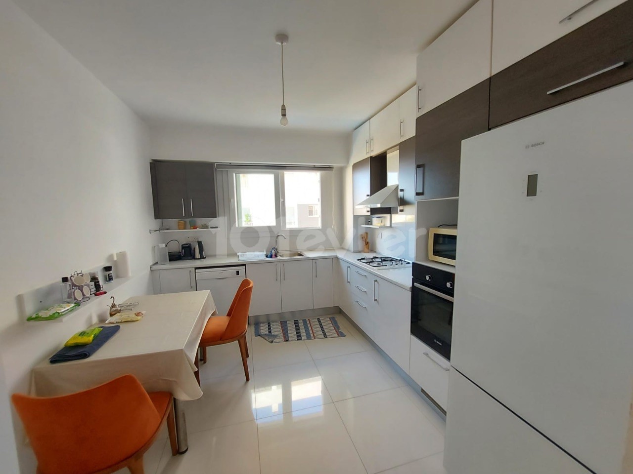 3+1 furnished luxury flat for rent in a secure complex with a communal pool in the center of Kyrenia