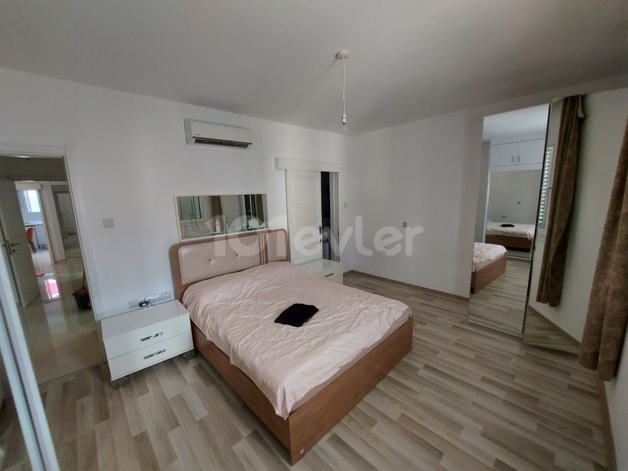 3+1 furnished luxury flat for rent in a secure complex with a communal pool in the center of Kyrenia