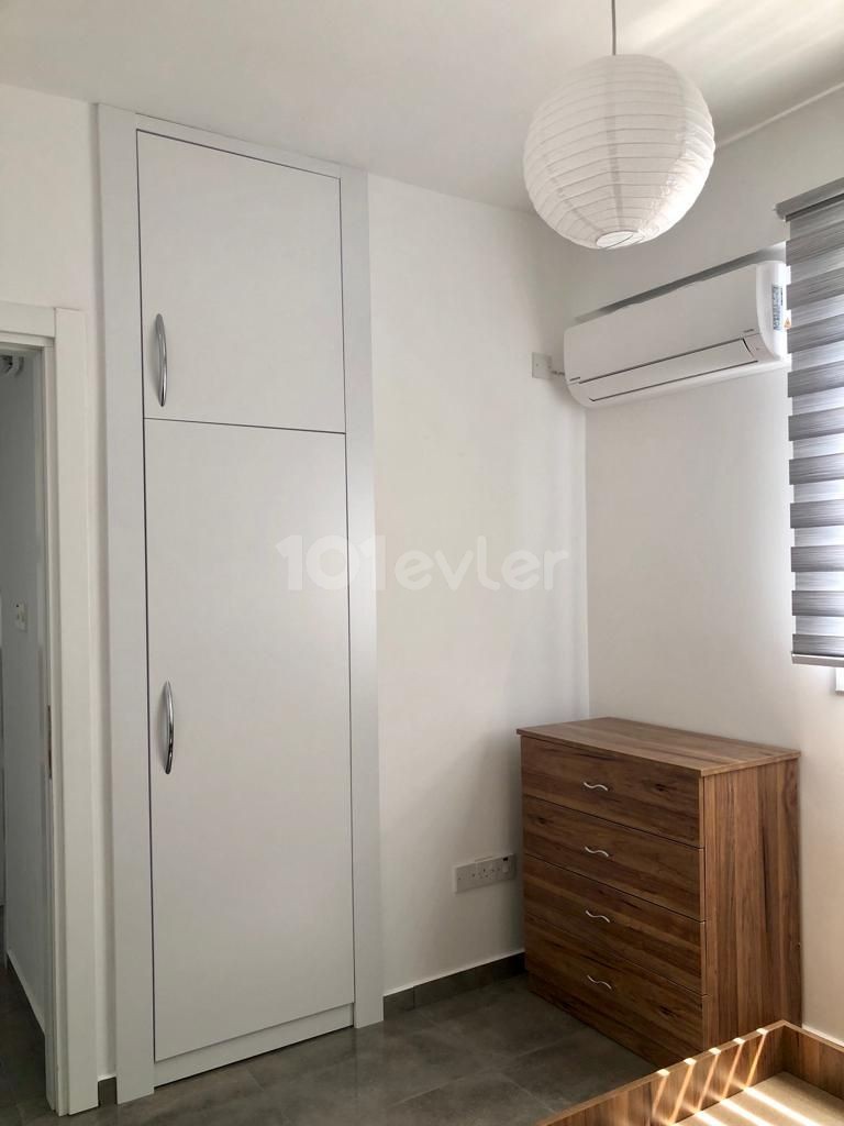 Unfurnished 2 + 1 apartment for sale with elevator in a central location in Kizilbash  