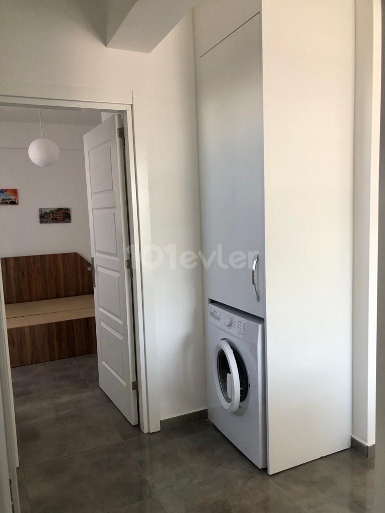 Unfurnished 2 + 1 apartment for sale with elevator in a central location in Kizilbash  