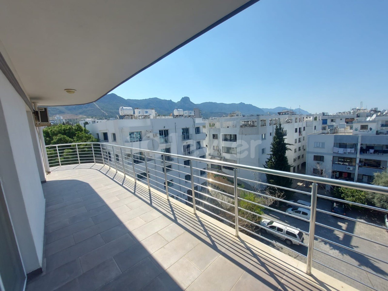 3 + 1 luxury apartment with en-suite bathroom for rent in the center of Kyrenia, next to Sulu Çember, in a building with elevator