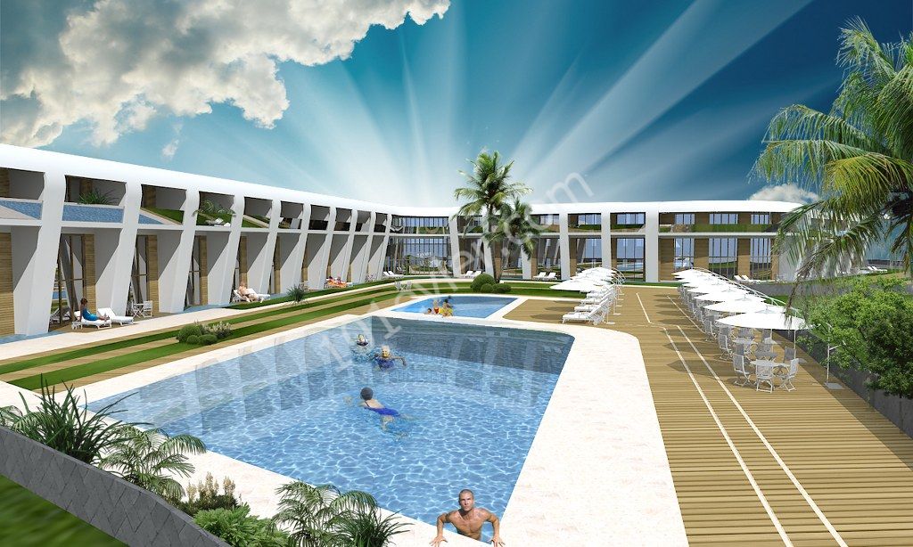 Lapta'da denize yürüyüş mesafesinde ortak havuzlu lüks sitede kapalı alan 77m² bahçe kullanımlı olan 2+1 satılık daire (teslim tarihi aralık 2019)