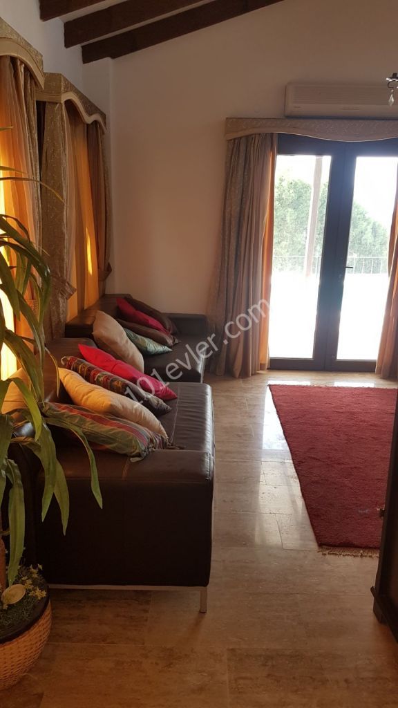 3+1 villa with private pool in Karşıyaka with magnificent mountain and sea views.