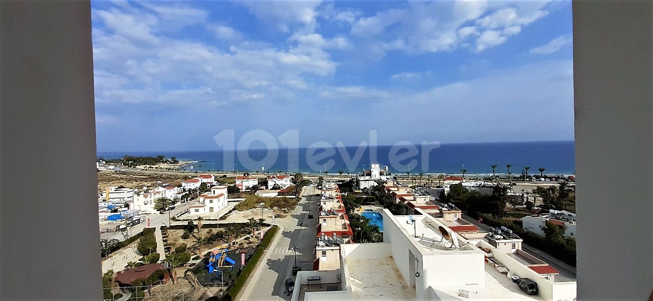 Sea View 1+1 Flat For Sale In Iskele Longbeach