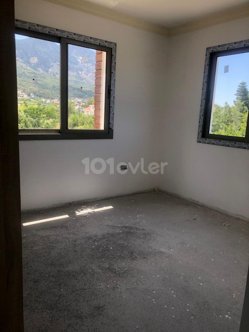 2+1 Flat With A Garden and Mountain View For Sale In Lapta