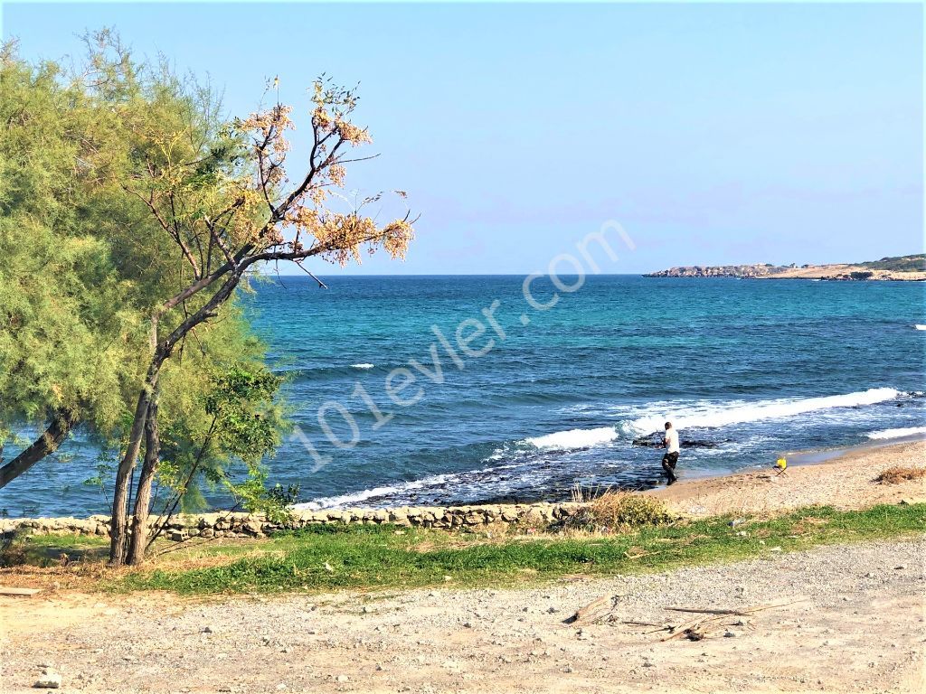 For sale beachfront villa in Karaolanolu with amazing sea view.