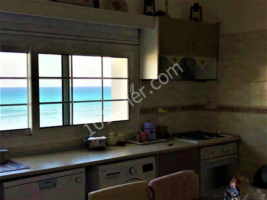 For sale beachfront villa in Karaolanolu with amazing sea view.