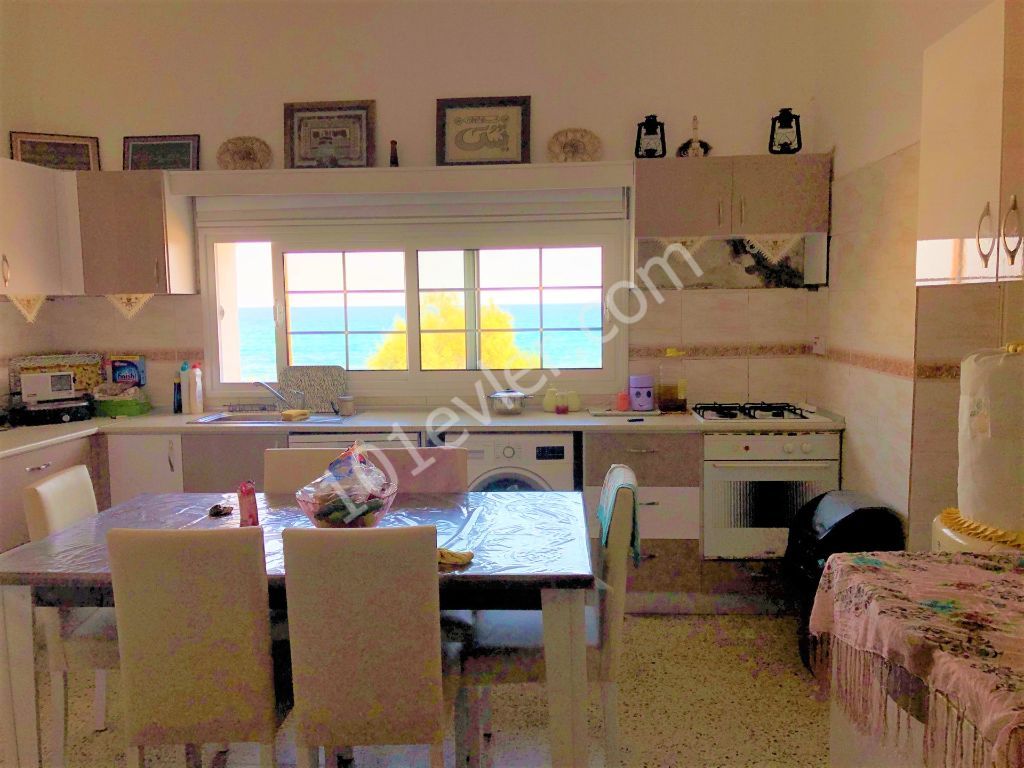 For sale beachfront villa in Karaolanolu with amazing sea view.