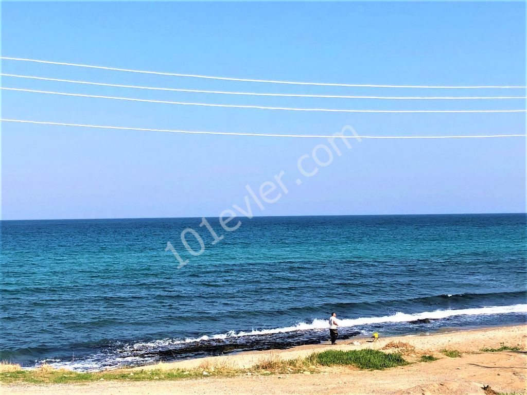 For sale beachfront villa in Karaolanolu with amazing sea view.