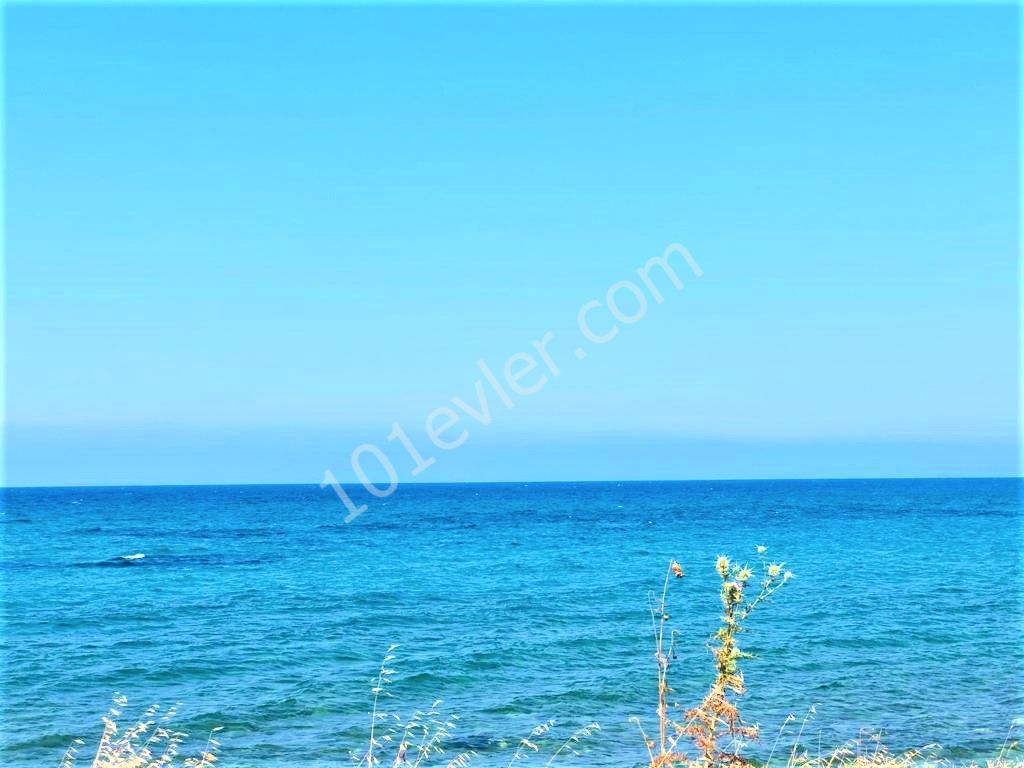 Land for sale with a sandy beach in Famagusta ** 