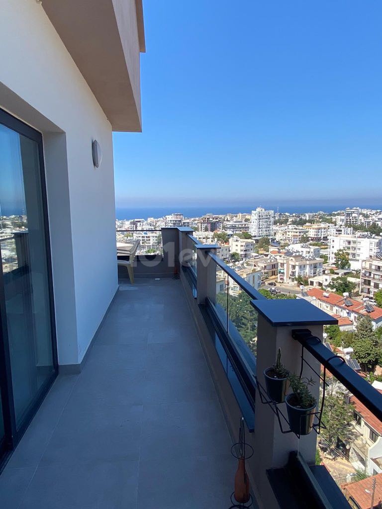 FASCINATING PENTHOUSE WITH MOUNTAIN AND SEA VIEW IN THE HEART OF KYRENIA