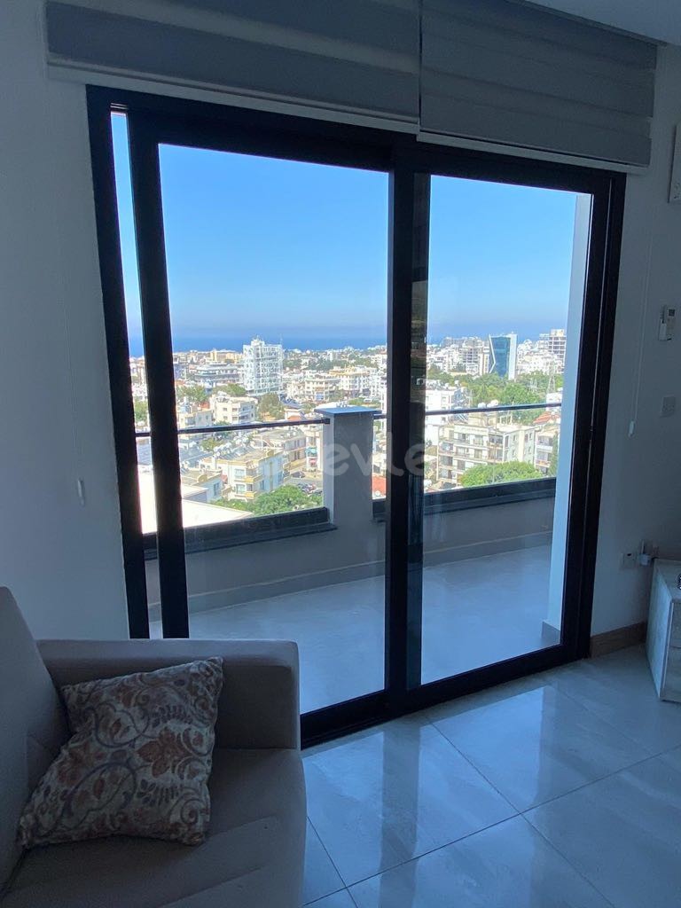 FASCINATING PENTHOUSE WITH MOUNTAIN AND SEA VIEW IN THE HEART OF KYRENIA