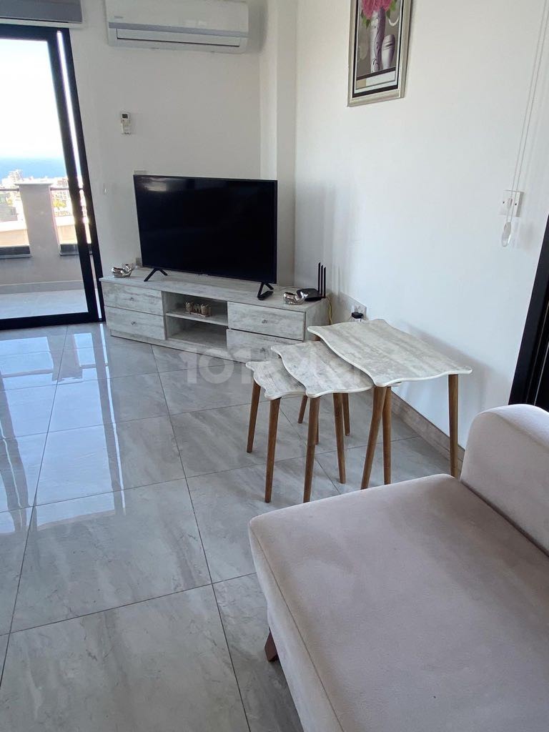 FASCINATING PENTHOUSE WITH MOUNTAIN AND SEA VIEW IN THE HEART OF KYRENIA