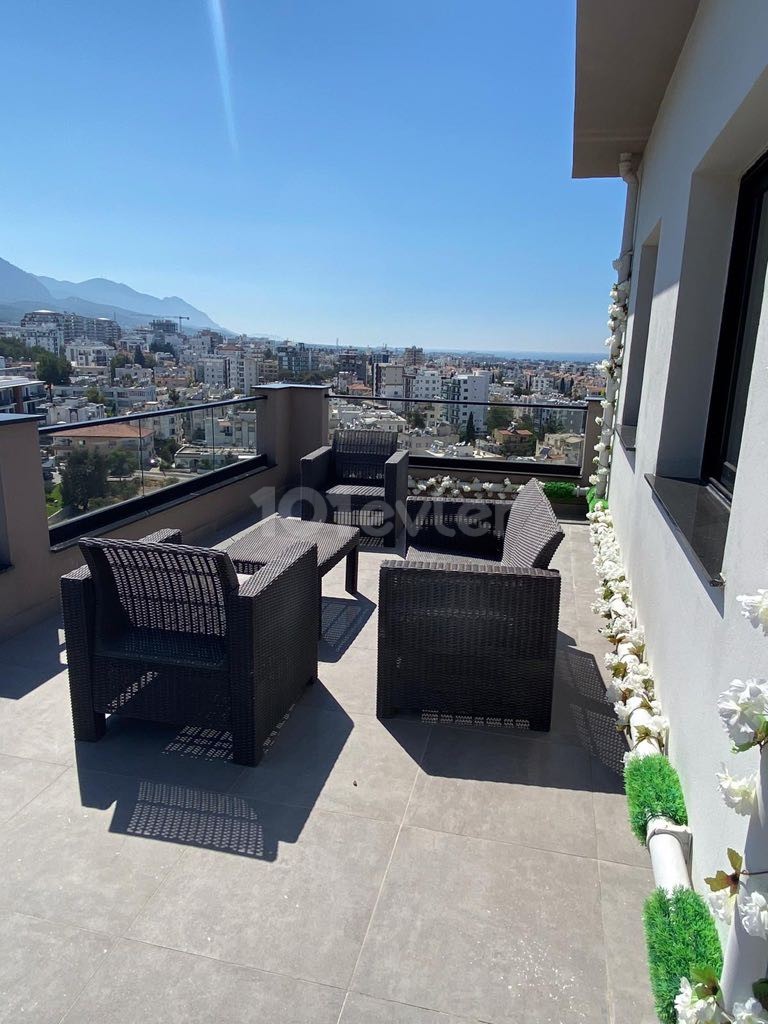 FASCINATING PENTHOUSE WITH MOUNTAIN AND SEA VIEW IN THE HEART OF KYRENIA