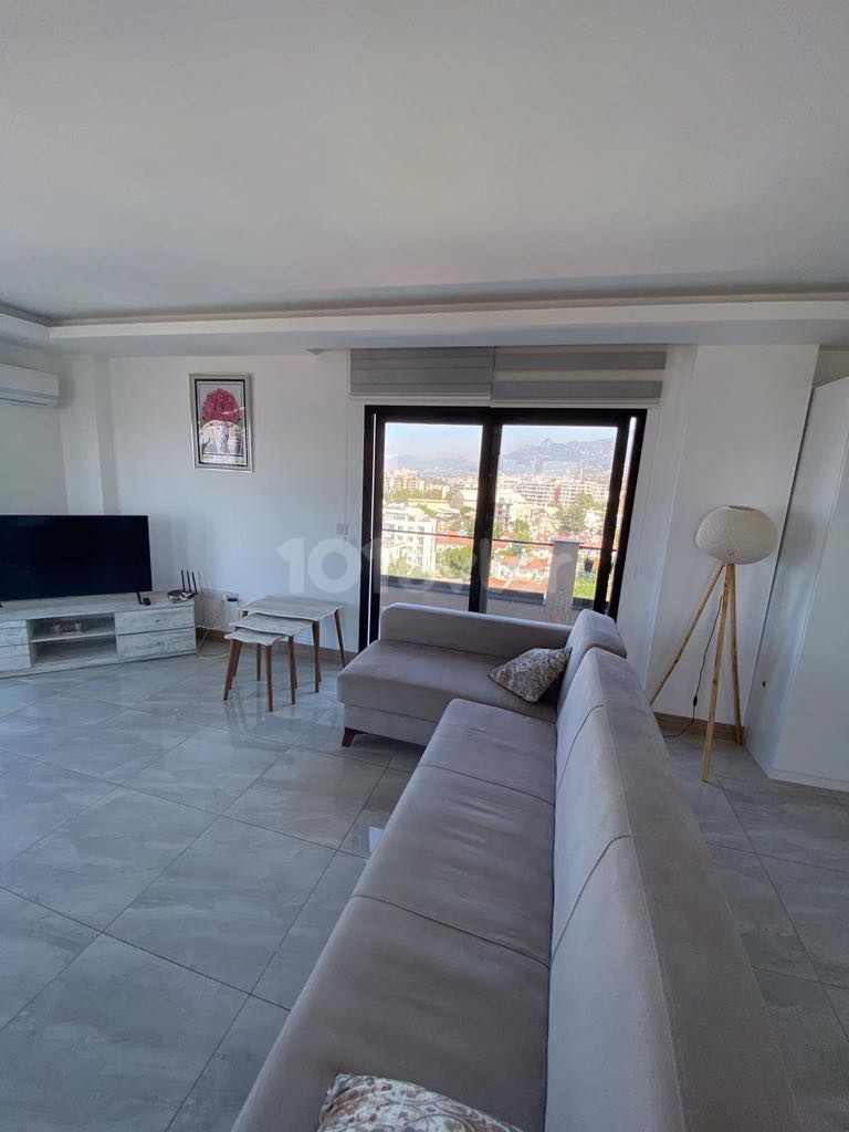 FASCINATING PENTHOUSE WITH MOUNTAIN AND SEA VIEW IN THE HEART OF KYRENIA