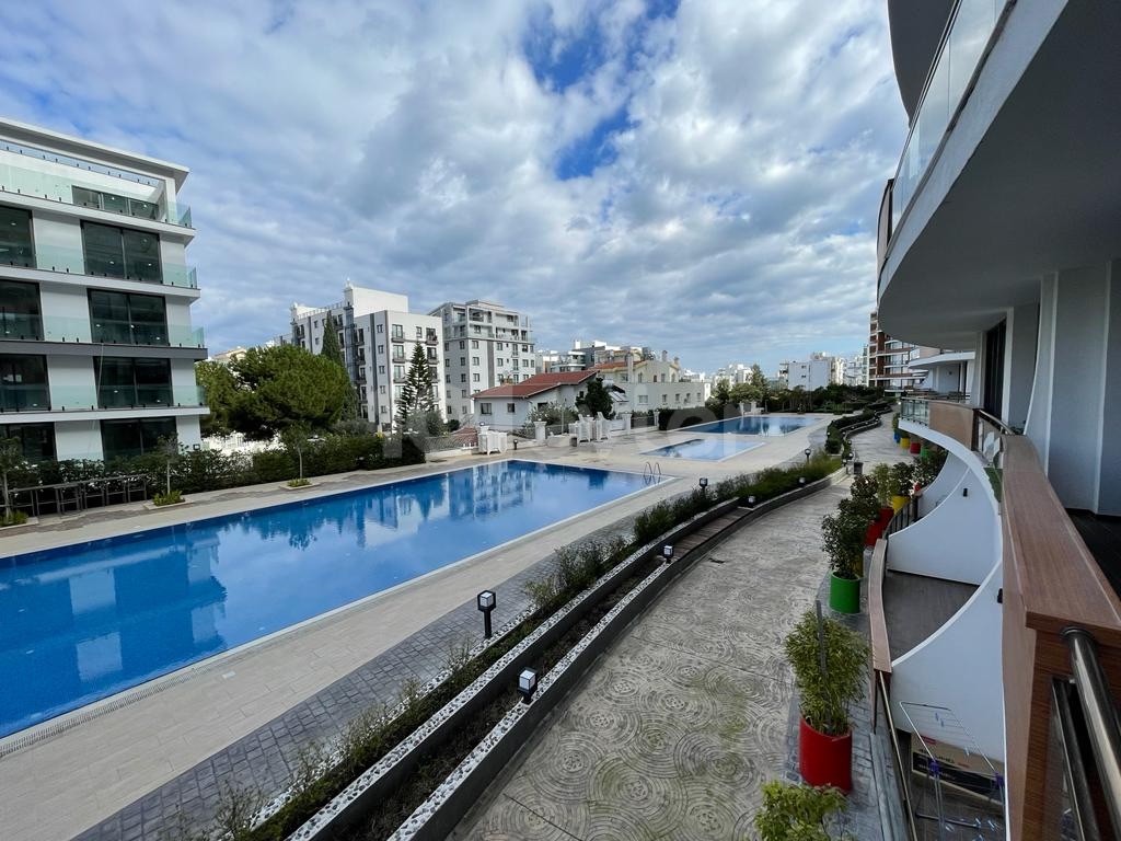 2+ 1 LUXURY APARTMENT WITH A FULLY FURNISHED 125m2 TERRACE WITH A SHARED POOL, READY-TO-USE COB, IN KYRENIA CENTRAL ELEGANCE ** 