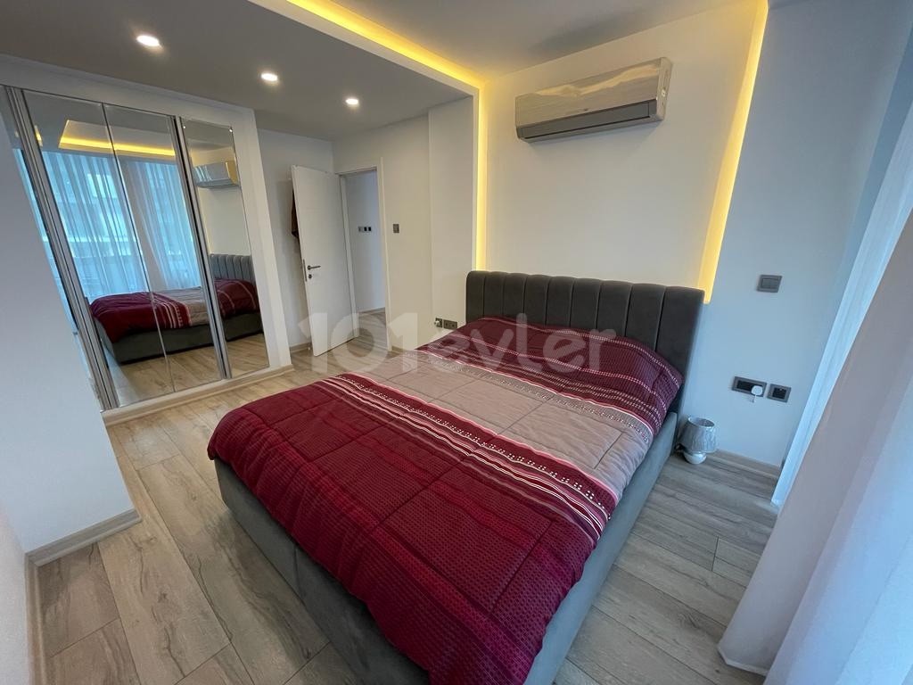 2+ 1 LUXURY APARTMENT WITH A FULLY FURNISHED 125m2 TERRACE WITH A SHARED POOL, READY-TO-USE COB, IN KYRENIA CENTRAL ELEGANCE ** 