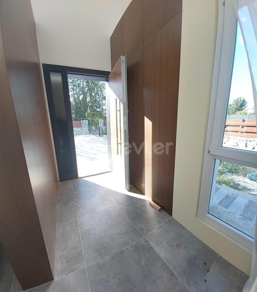 Triplex villa for sale in Karaoglanoglu, Kyrenia with mountain and sea views