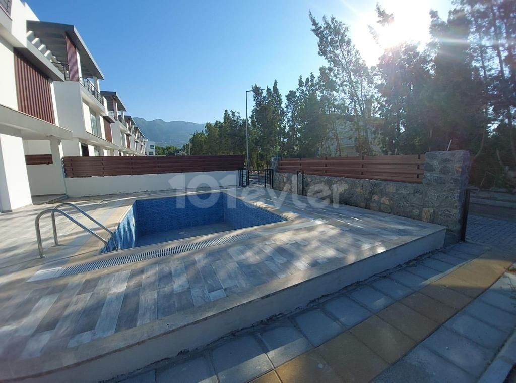 Triplex villa for sale in Karaoglanoglu, Kyrenia with mountain and sea views