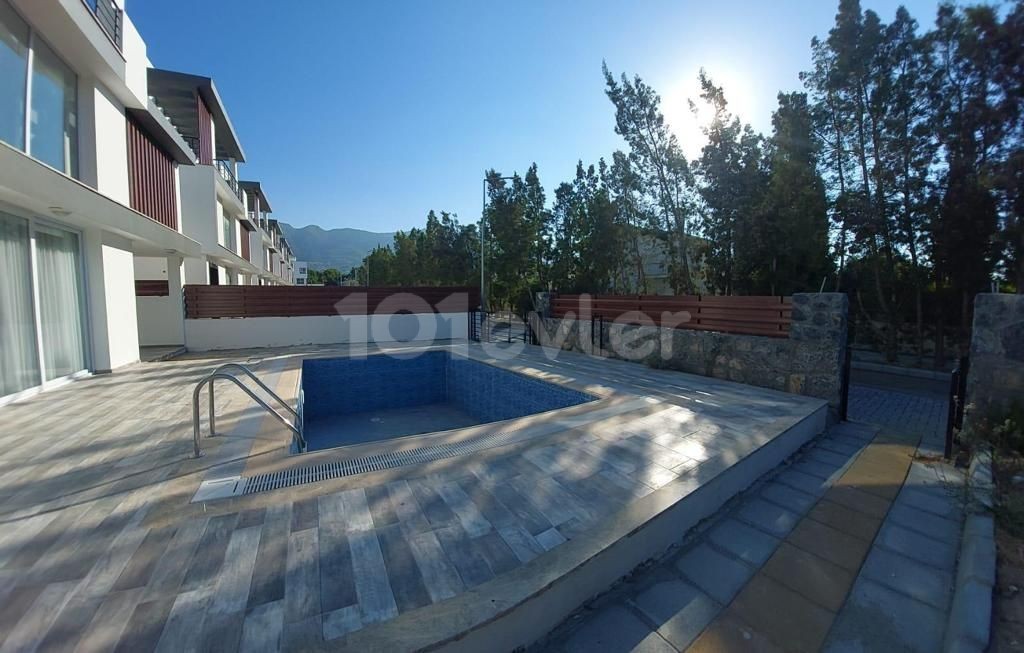 Triplex villa for sale in Karaoglanoglu, Kyrenia with mountain and sea views