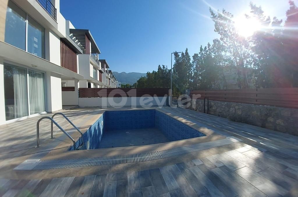 Triplex villa for sale in Karaoglanoglu, Kyrenia with mountain and sea views