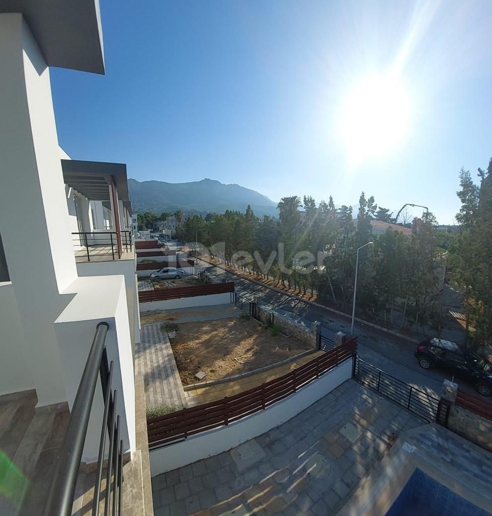 Triplex villa for sale in Karaoglanoglu, Kyrenia with mountain and sea views