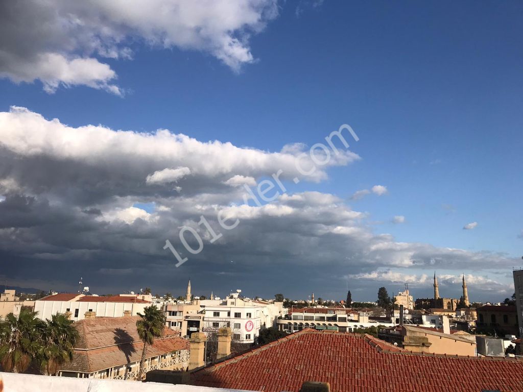 In Front of the Courts within the Central Walls of Nicosia ** 