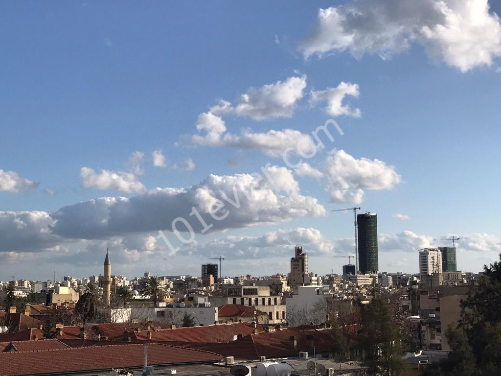 In Front of the Courts within the Central Walls of Nicosia ** 