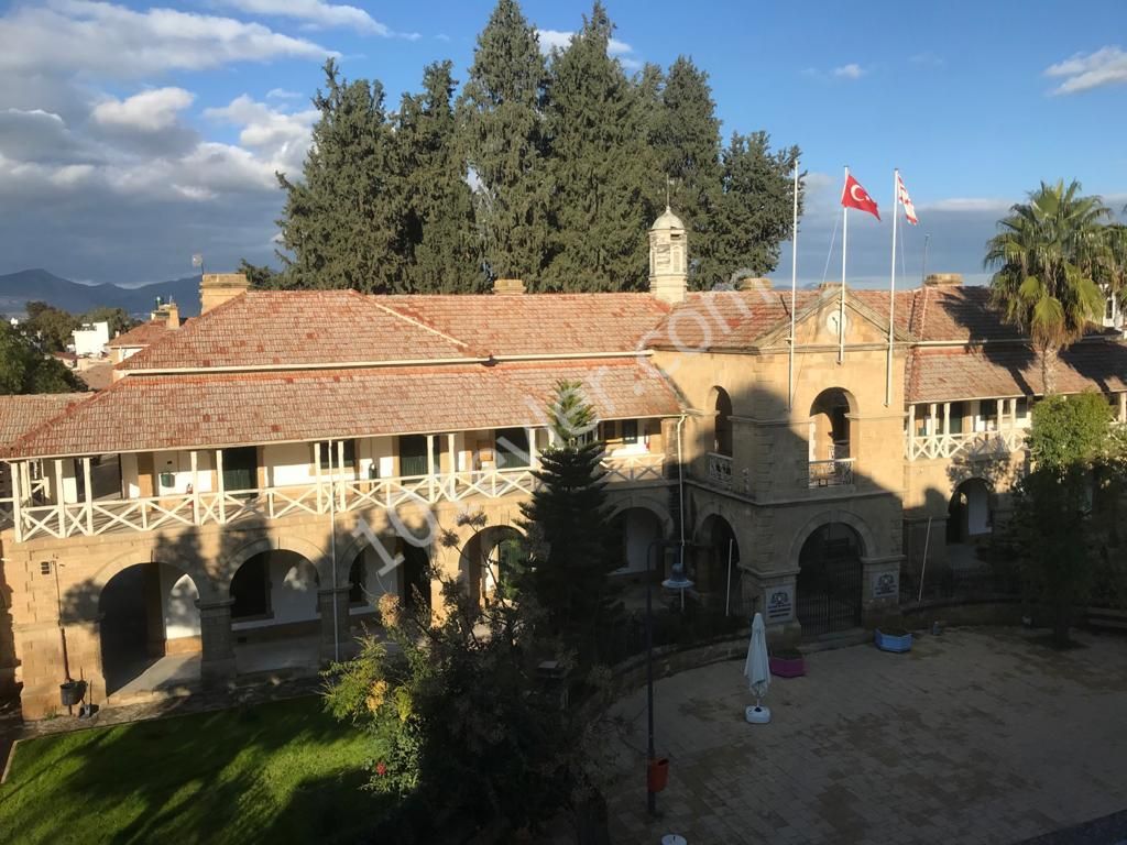 In Front of the Courts within the Central Walls of Nicosia ** 