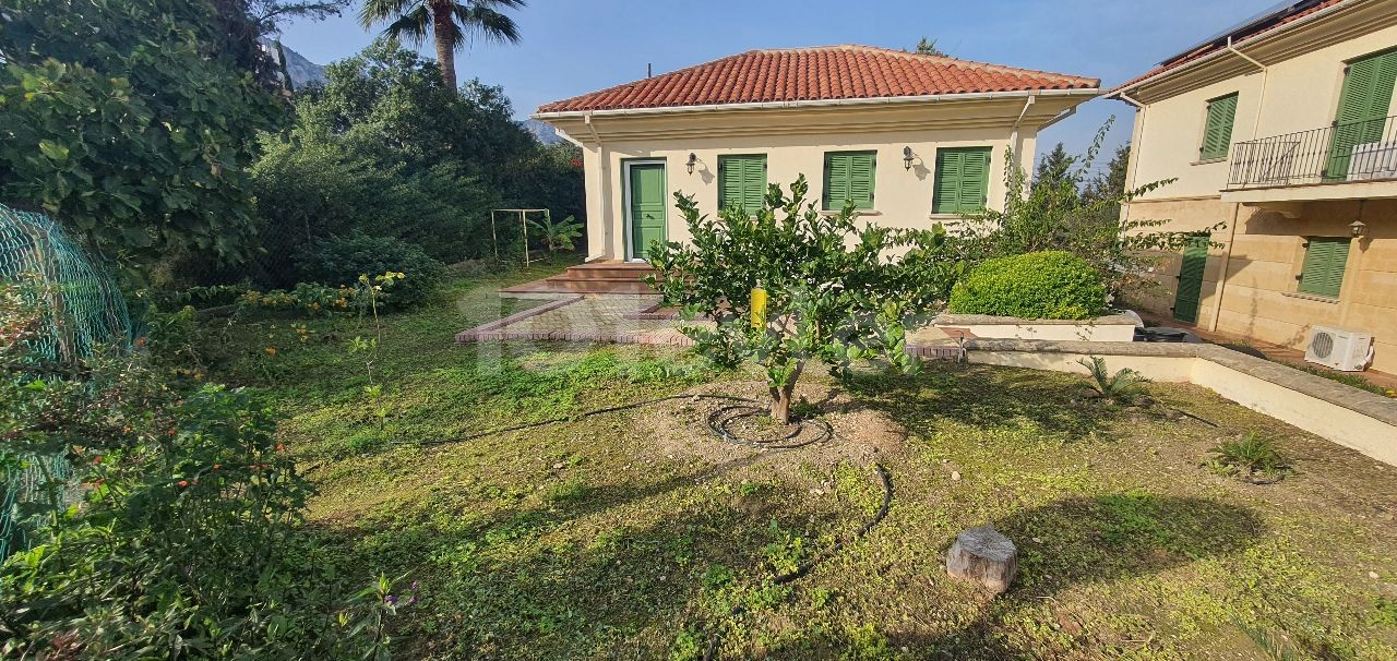 950m2 with magnificent mountain and sea views in Çatalköy. this magnificent villa with 5 bedrooms and a swimming pool in 3.5 acres of land, the view of which is never closed ** 