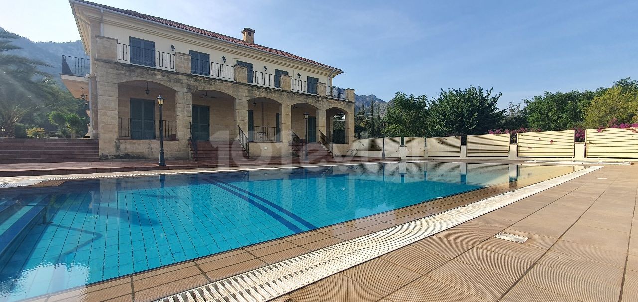 950m2 with magnificent mountain and sea views in Çatalköy. this magnificent villa with 5 bedrooms and a swimming pool in 3.5 acres of land, the view of which is never closed ** 