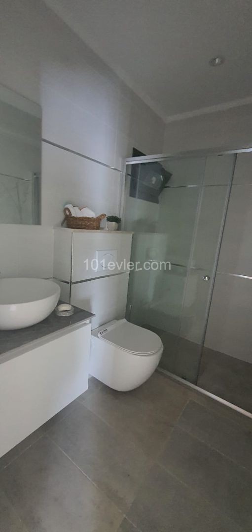 Girne Zeytinlik 3 min to drive center,91 m2 flats with a communal pool .