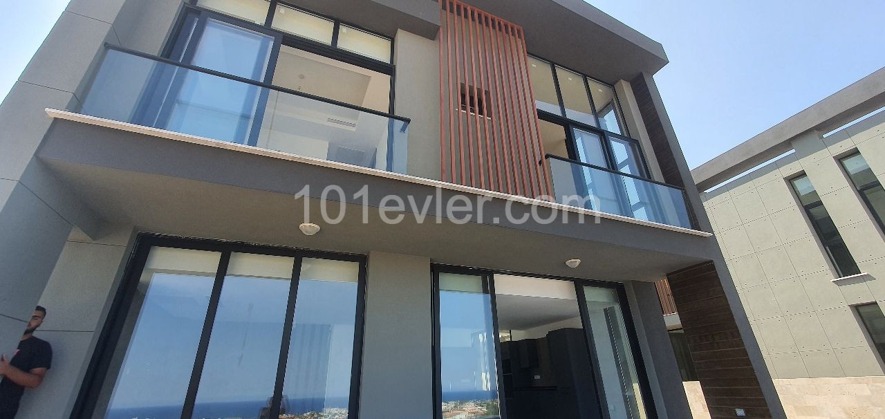 Kyrenia Escape Beach area 4+1 detached villa.Full sea view, pool view...(Equivalent Title Deed)Finished 275,000 STG, they will be finished after 1 year 250,000 STG ** 