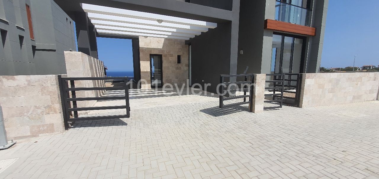 Kyrenia Escape Beach area 4+1 detached villa.Full sea view, pool view...(Equivalent Title Deed)Finished 275,000 STG, they will be finished after 1 year 250,000 STG ** 