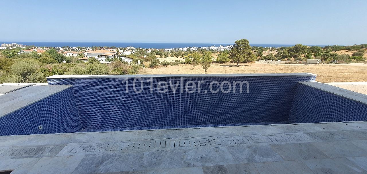 Kyrenia Escape Beach area 4+1 detached villa.Full sea view, pool view...(Equivalent Title Deed)Finished 275,000 STG, they will be finished after 1 year 250,000 STG ** 