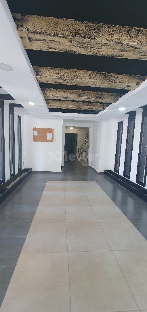 Kyrenia Nusmar market district is located in the prestigious building 1. The apartment has a private indoor garage with a balcony on the floor, a double bathroom with a toilet...Esyal is.(+3000 stg).. .Taxes have been paid. ** 