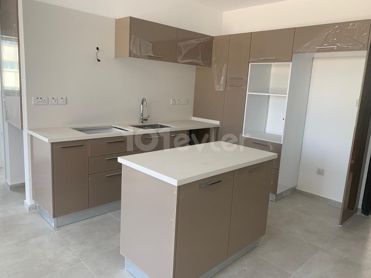 Apartments in a luxury building in Kyrenia Susico Far Eastern Restaurant district 2+1 Apartments with a permit of GBP 75,000 or office of 85,000. ** 