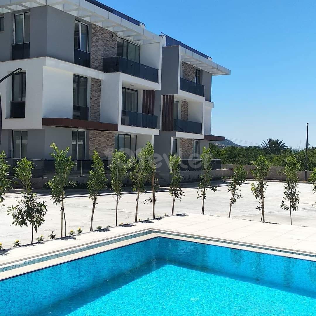 Kyrenia Lapta Babylonian Gardens area, all taxes paid, ground floor garden apartment on a site with a pool of 70 m2. Central heating cooling,24-hour hot water, very spacious apartment..500 meters from the beach.ALSO 2+1 90.000 stg +VATavilable ** 