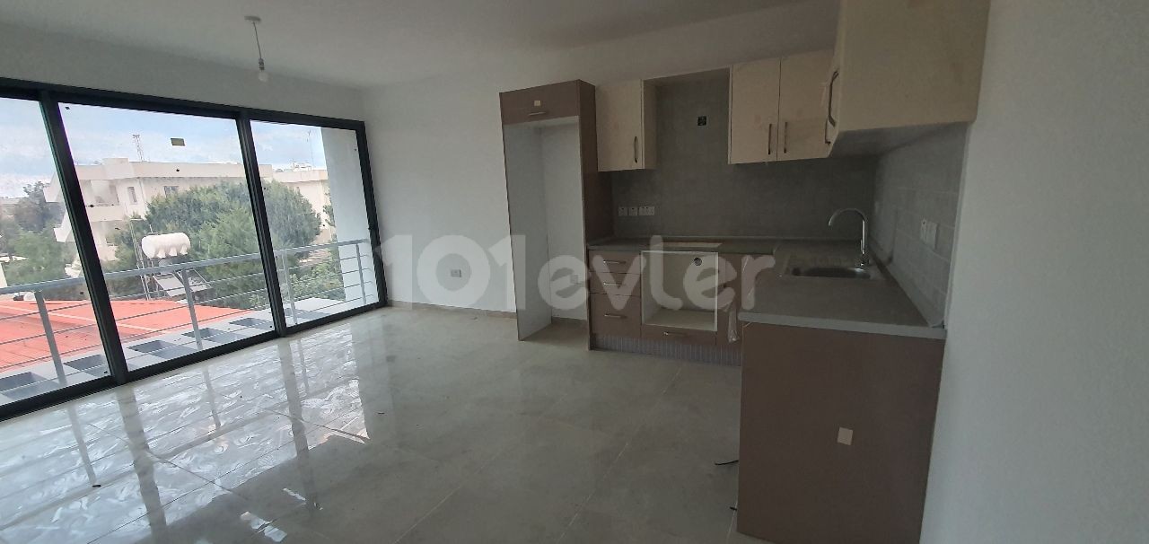 2+1 luxury flat in the center of Kyrenia, Turkish Hearth Club and Barbaroslar market area in a brand new building. VAT unpaid