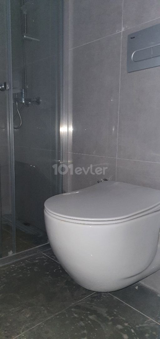 2+1 luxury flat in the center of Kyrenia, Turkish Hearth Club and Barbaroslar market area in a brand new building. VAT unpaid