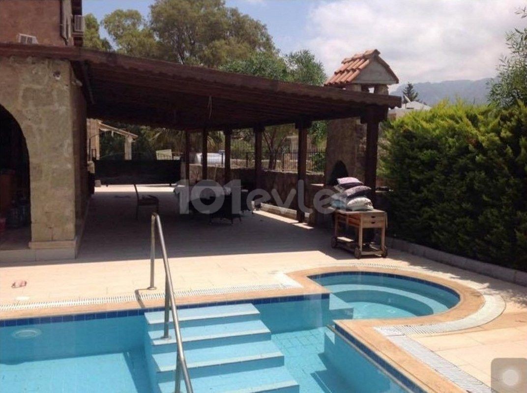 Authentic stone house by the sea in Lapta, Kyrenia. . . Garden with pool. . 