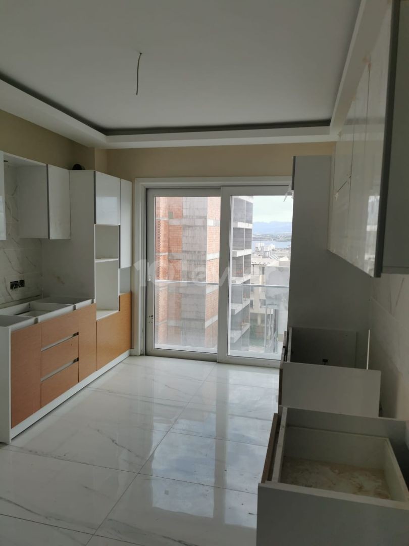 Kyrenia Eziç Penuts area 140 m2 mountain and sea view, 3+1 3rd floor apartment. Complex with pool, security available. 