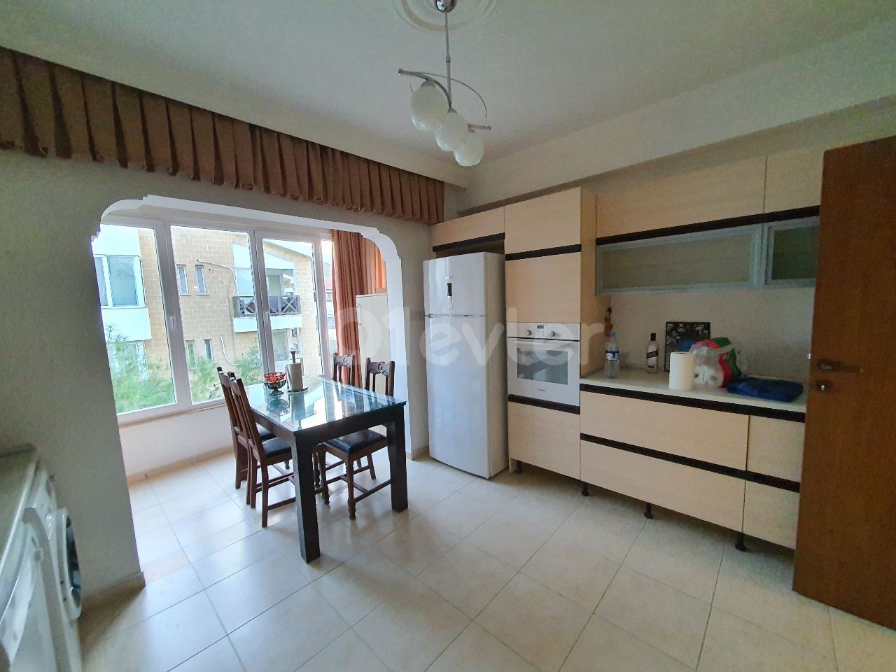 Kyrenia Center; Newly furnished spacious apartment in a complex with communal pool