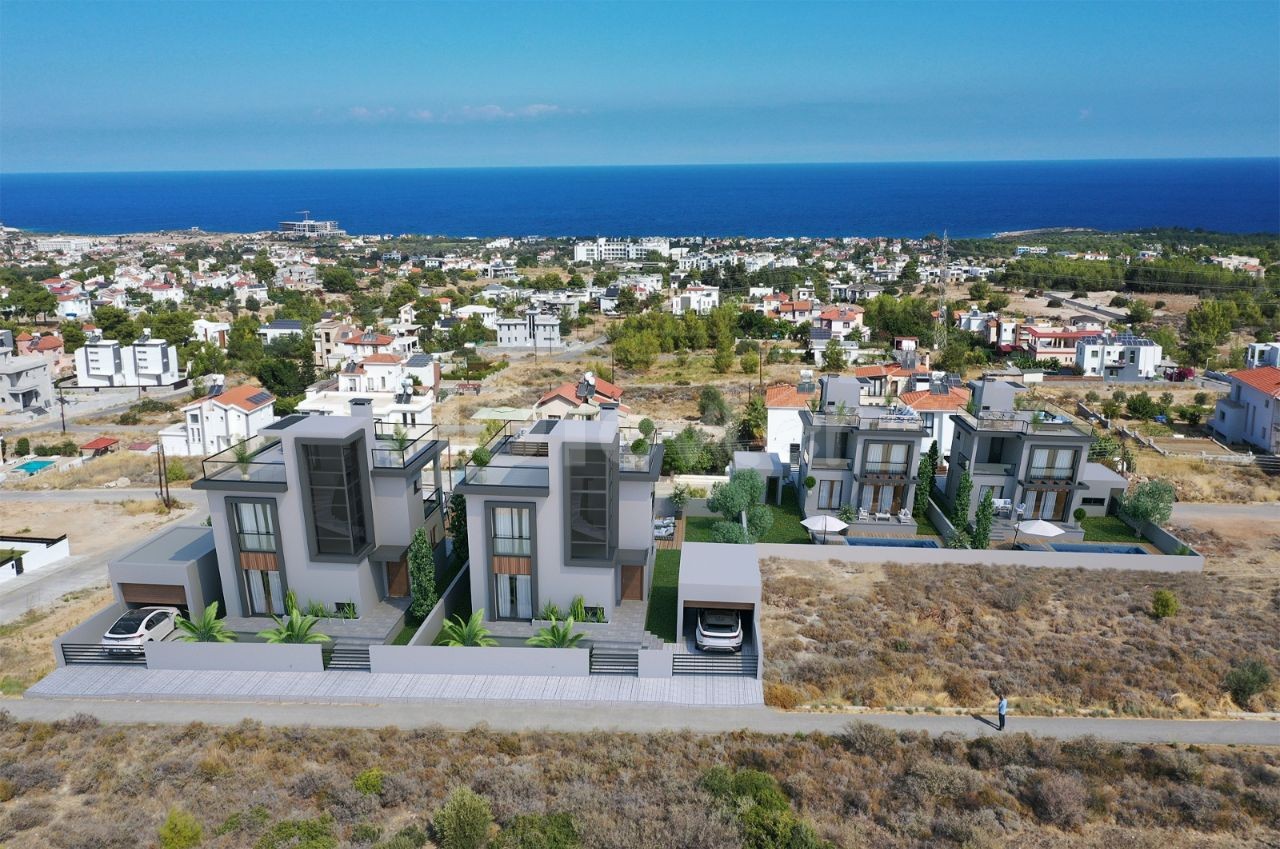 High-rise villas with mountain and sea views and private pools in Çatalköy.