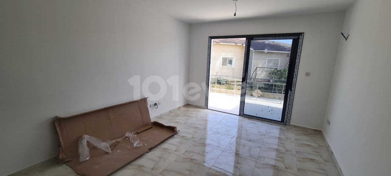 Ground floor 3+1 apartment with garden in Haspolat. 