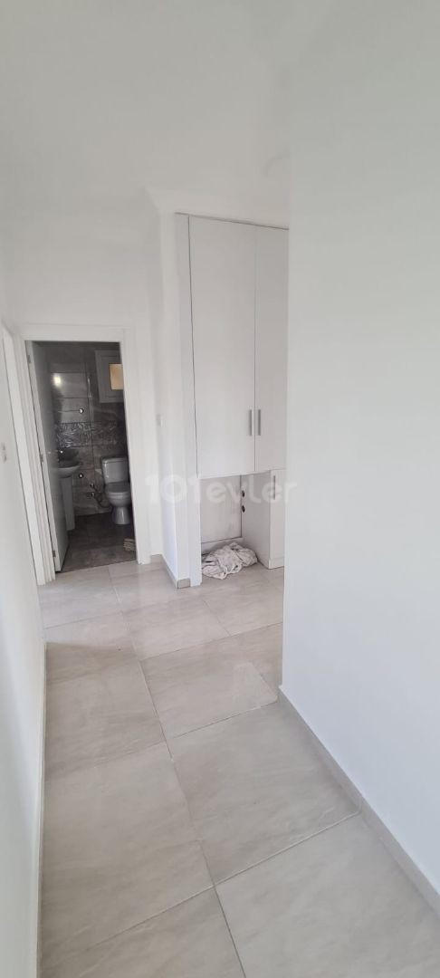 140m2 3+1 flat with Turkish title in Yenikent center.