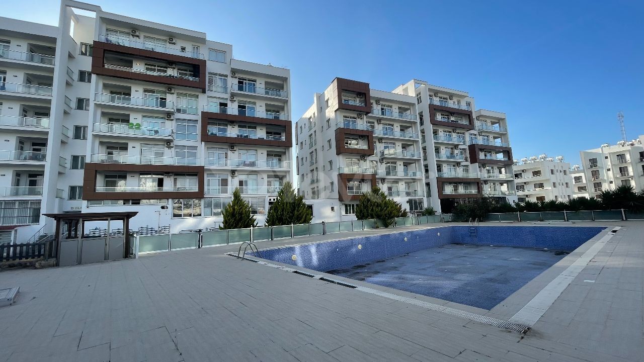 2+1 FLATS FOR SALE WITH COMMON POOL IN LEFKE / GEMİKONAĞI CENTER, FOR LIVING AND INVESTMENT