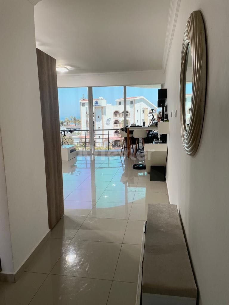 Fully furnished 1+1 apartment with sea view within walking distance of GAU