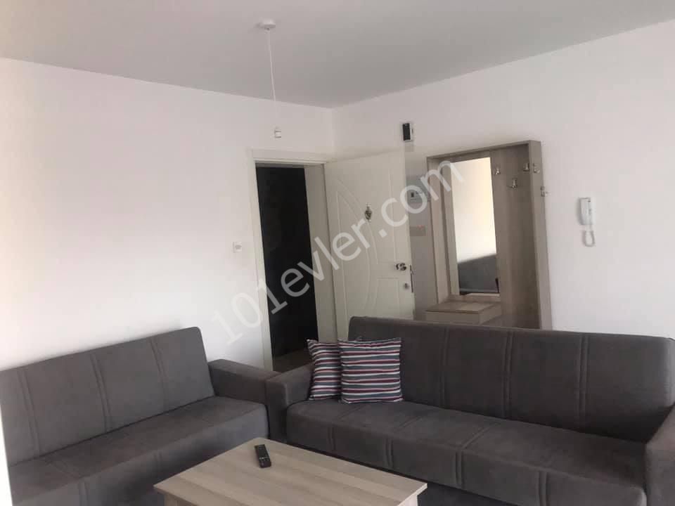 Girne Merkez'de 2+1 kiralık yeni apartman dairesi. 05338445618