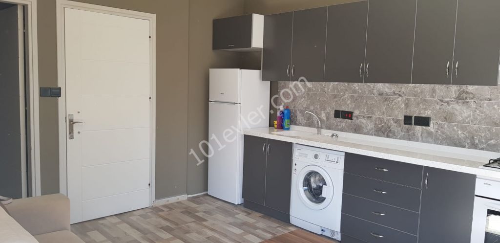 girne merkezde aslanlı villada full eşyalı kiralık 2+1 lüks eşyalı daire..   05338445618